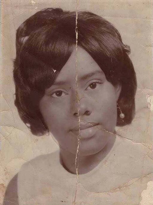 Damaged keepsake portrait before restoration